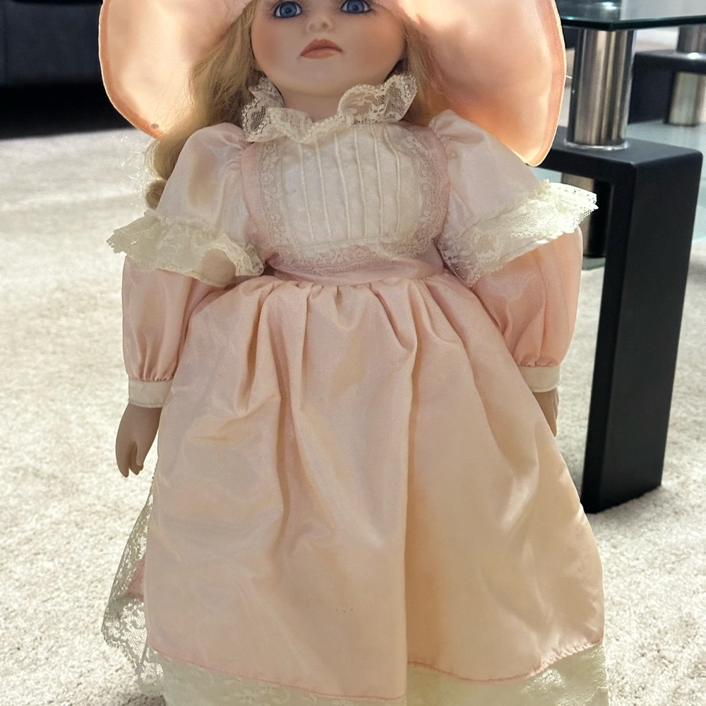 Elegant Pink Porcelain Doll